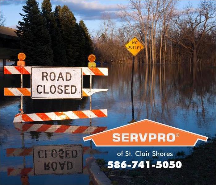 A Michigan road is closed due to flooding.