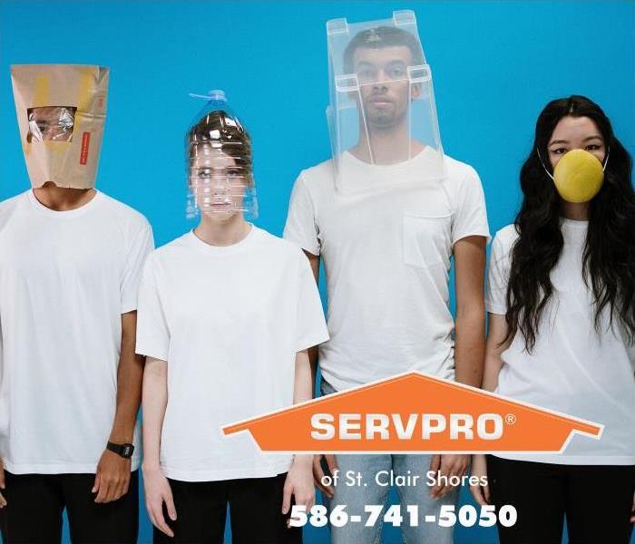 Four teenagers demonstrate various styles of protective face coverings.