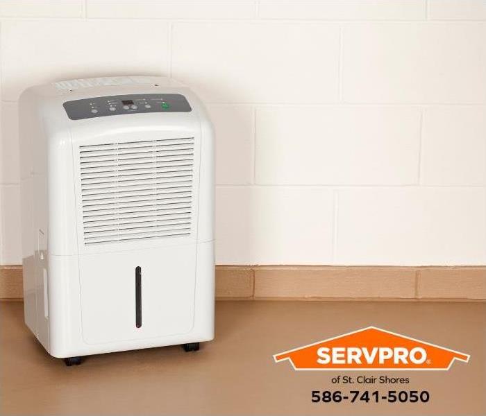 A dehumidifier is used to control moisture in a room. 